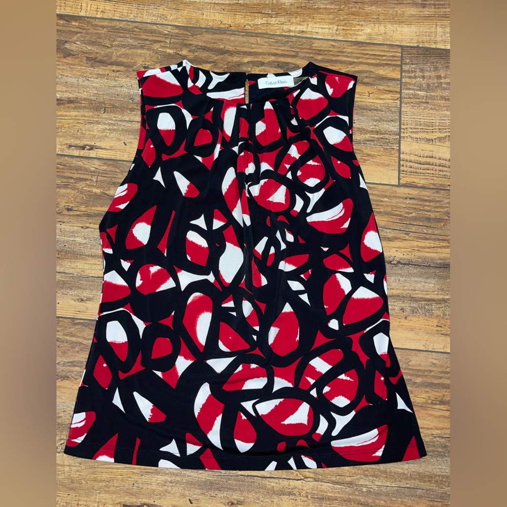 Black white and red sleeveless blouse by Calvin Klein